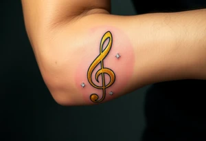 A gold treble clef with subtle silver accents, surrounded by delicate sparkles tattoo idea
