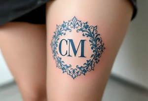 Victorian Lace Monogram – Ivory and dusty blue “C / M” styled in ornate vintage typography with lace-like borders. tattoo idea