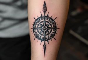 compass/clock with a large native American arrow tattoo idea