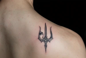close-up woman behind a trident tattoo idea