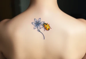 Golden or yellow ladybug on a lavender flower tattoo idea