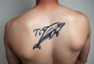 The name Ti'Asha with a dolphin for my mom favorite animal tattoo idea