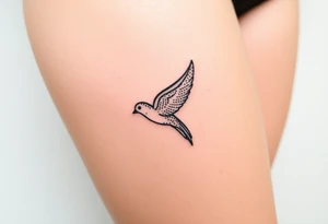 swallow flying with its wings out and forward tattoo idea