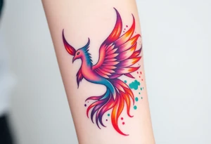 Phoenix with blazing flames with purple, orange, teal and green splashes tattoo idea