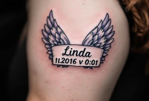 pair of angel wings enclosing name Linda and numbers 1.1.2016 v 0:01", done in light gray and faded lilac. tattoo idea
