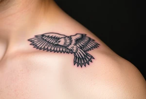 A detailed black-and-gray eagle with intricately shaded feathers, symbolizing strength and wisdom tattoo idea