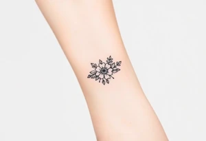 A delicate floral pattern around the entire circumference of the finger, inspired by wedding flowers, such as roses, peonies or lavender. tattoo idea