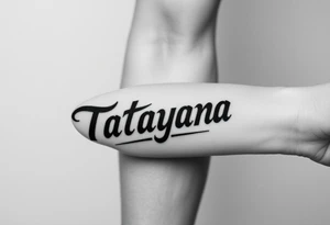 Tattoo for a man that says the name “Tatayana” tattoo idea