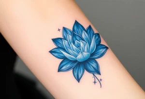 A deep blue water lily, with soft silver outlines and subtle star-like sparkles tattoo idea