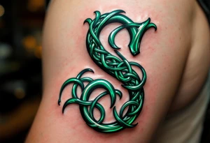 A shiny emerald green "S" with intricate Celtic knotwork wrapped around it. tattoo idea