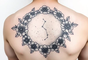 Night sky with a constellation seen through a floral frame tattoo idea