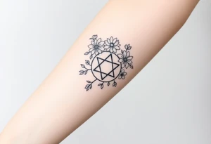 Large fine line florals that cover up an enneagram symbol tattoo idea