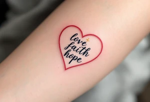 Tiny black font love faith hope placed within a heart outline in red, with a gold cross on top and a blue anchor below. tattoo idea