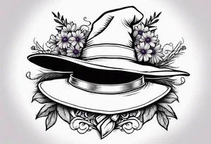 A witch hat tattoo with two ribbons coming down to form a loose bow and daisies and lavender adorning the brim tattoo idea