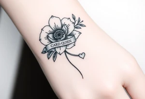 A beautiful flower with a card queen sign and a ribbon tied around the flower with banríona and a small heart tattoo idea
