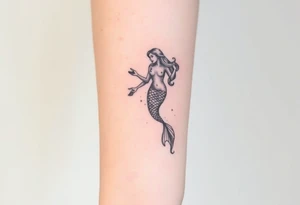 Realistic tattoo on forearm of a mermaid tattoo idea