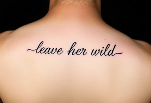 small fine line tattoo of words "leave her wild" all connected tattoo idea