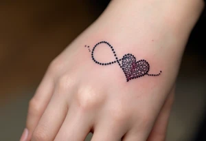 A lace-textured infinity outline in dark gray, with a soft burgundy heart sewn into the design. tattoo idea