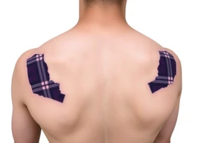 Dark Purple with green pink blue and white highlights tartan fabric with flesh peeling away at edges around shoulder tattoo idea