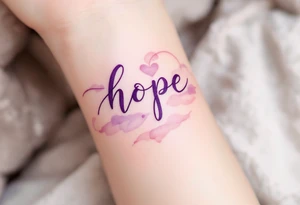 A soft script in pastel pink and lavender, wrapping around the wrist, symbolizing hope and inner faith. tattoo idea