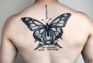 butterfly with cracked wings and lotus flower with quote that says “she wore her scars like wings” all down spine but very elegant towards lower back tattoo idea