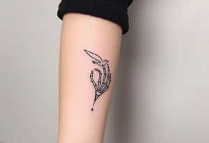 Skeleton hand reaching out of the ocean for a flying swallow tattoo idea