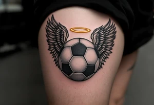 A black and gray soccer ball with angel wings and a golden halo above. tattoo idea