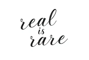 "real is rare" quote in straight line style tattoo idea