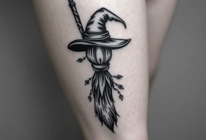 Which is broom with handle
 a witches hat with vines and feathers 
Smaller broom with hat placed on top or in the middle
Feminine and on a leg tattoo idea
