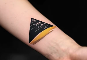 A jet-black pyramid casting a shadow over a golden sand dune. tattoo idea