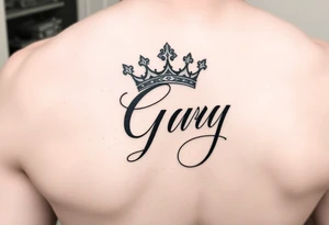 Capital G in handwritten script with a crown tilted to the left on the front right shoulder tattoo idea