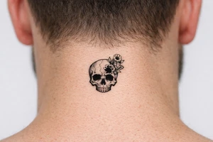 Skull with bullet hole, flowers erupting from the exit wound. tattoo idea