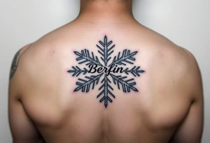 Snowflake with Blue backround and the name „Berfin“ in it tattoo idea
