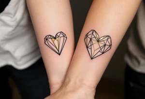 A pair of geometric hearts in black and gold ink etched into the forearms, symbolizing balance and unity. tattoo idea