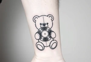 minimalist teddy bear smiling and holding a vinyl record tattoo idea