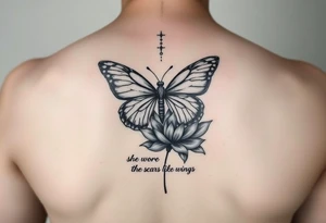 butterfly with cracked wings and lotus flower with quote that says “she wore her scars like wings” all down spine but very elegant tattoo idea