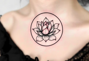 A thin black circle enclosing a delicate lotus flower in soft pink and white. tattoo idea