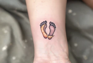 Soft peach and white footprints of Laura, with a whimsical moon cradling the prints, as a reminder of her gentle dreams. tattoo idea
