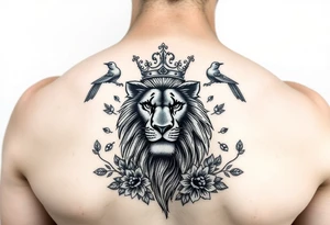 powerful majestic lion with a crown, surrounded by floral ornaments and birds tattoo idea