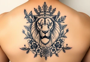 powerful majestic lion with a crown, surrounded by floral ornaments and birds tattoo idea