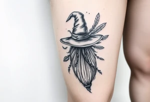 Which is broom with handle
 a witches hat with vines and feathers 
Smaller broom with hat placed on top or in the middle
Feminine and on a leg tattoo idea