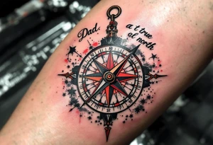 A traditional-style compass with red and black detailing, pointing toward “Dad” at true north. tattoo idea