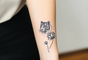 fierce tiger emerging through blooming lotus flowers in mist tattoo idea