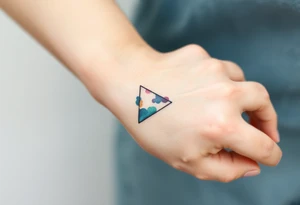 A small tattoo (2x2cm) on my wrist to represent my lesbian identity, but in a subtle way. Fine line. Triangle tattoo idea