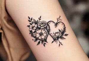 Matching flowery hearts in black ink tattoo idea