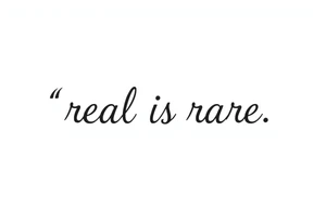 "real is rare" quote in sleky style tattoo idea