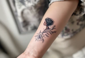 A tattoo with a black woman in it about divinity tattoo idea