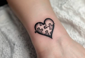 A heart with a puzzle piece missing, left in hollow grayscale tones, symbolizing the emptiness of heartbreak. tattoo idea