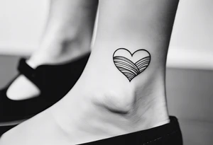 small feminine unique minimalist tattoo on ankle symbolizing love and family tattoo idea