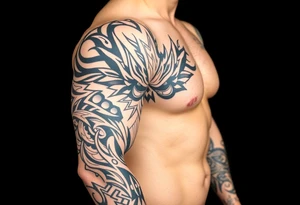The Fiend top center piece of sleeve with Polynesian tribal design surrounding covering up old tattoo tattoo idea